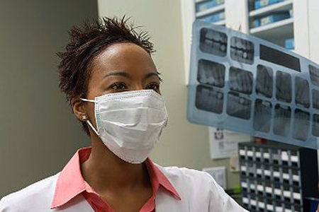 dentist-examining-x-rays copy