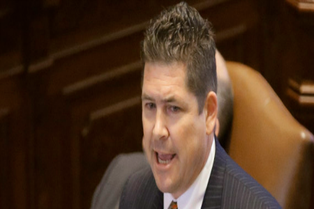 Illinois Sen. Kyle McCarter, R-Vandalia, on the Senate floor during session at the Illinois State Capitol Wednesday, May 29, 2013, in Springfield, Ill. (AP Photo/Seth Perlman) | ASSOCIATED PRESS