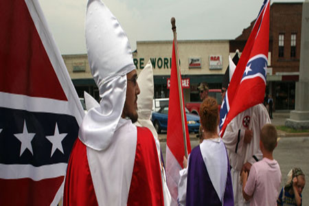 Schools across the country still bear the names of controversial leaders, who at one point in their lives wanted to deny African Americans basic human rights. In this photo, members of the Fraternal White Knights of the Ku Klux Klan participate in the 11th Annual Nathan Bedford Forrest Birthday march July 11, 2009 in Pulaski, Tenn. | Spencer Platt via Getty Images