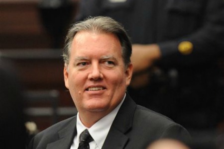 Michael Dunn smiles at his parents during a break in his trial in Jacksonville, Fla. Wednesday, Feb. 12, 2014. Dunn is charged in the shooting death of Jordan Davis in November 2012. (The Florida Times-Union, Bob Mack, Pool)