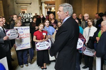 Curt Smith, president of Indiana Family Institute, speaks to a group from Citizens for Community Values of Indiana at a noon rally at the Indiana Statehouse in Indianapolis, Thursday, Feb. 13, 2014. The Indiana Senate effectively pushed off a statewide vote on a gay marriage ban for at least two years, and possibly longer. In a parliamentary move that spared state senators a tough vote on the measure, the Senate advanced the marriage ban without the "second sentence" ban on civil unions. The House stripped that language from the amendment before passing it last month, and the Senate's decision not to restore the language before voting Thursday means the effort to amend the constitution must start fresh. (AP Photo/The Indianapolis Star, Charlie Nye) NO SALES