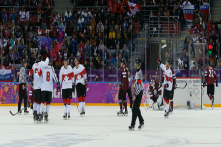 Team Canada celebrates a third period goal against Latvia during a men's quarterfinal ice hockey game at the 2014 Winter Olympics, Wednesday, Feb. 19, 2014, in Sochi, Russia. | ASSOCIATED PRESS