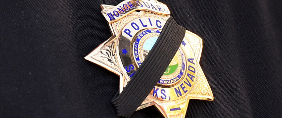 Second Funeral Held For Police Officers Shot By Extremist Couple