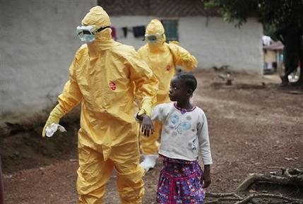FILE - In this Sept. 30, 2014, file photo, nine-year-old Nowa Paye is taken to an ambulance after showing signs of the Ebola infection in the village of Freeman Reserve, about 30 miles north of Monrovia, Liberia. An experimental antiviral drug shows some early, encouraging signs of effectiveness in its first human tests against Ebola in West Africa, but only if patients get it when their symptoms first appear (AP Photo/Jerome Delay, File)