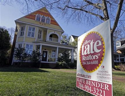 This Jan. 8, 2015 photo shows a home for sale in Charlotte, N.C. The National Association of Realtors reports on sales of existing homes in January on Monday, Feb. 23, 2015. (AP Photo/Chuck Burton)