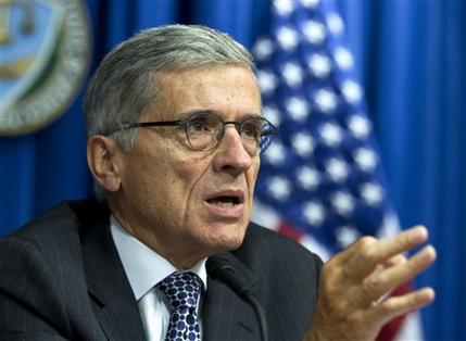 FILE - In this Oct. 8, 2014 file photo, Federal Communications Commission (FCC) Chairman Tom Wheeler speaks during new conference in Washington. Whose Internet is it anyway? Wheeler says he’s keeping that question in mind as he pitches the biggest regulatory shake-up to the telecommunications industry since 1996, when people still used noisy modems and referred to the “information superhighway” as a fun way to buy books or check the weather. ( AP Photo/Jose Luis Magana)