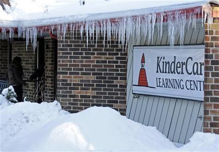 Icicles line the exterior of KinderCare Learning Center on East Palatine Road, Thursday, Feb. 5, 2015, in Palatine, Ill. Public health officials say students, staff and faculty at the facility have been notified and anyone who hasn't been vaccinated for measles has been instructed to stay away from unvaccinated individuals for the next three weeks after lab tests confirm measles in children from the day care. (AP Photo/Nam Y. Huh)