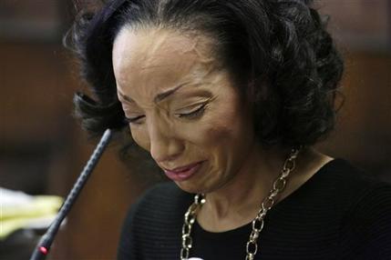 Sandra Wortham, the sister of slain Chicago police Officer Thomas Wortham IV, cries as she gives a statement during the sentencing hearing for Toyious Taylor and Paris McGee at the Leighton Criminal Court Building Wednesday, Feb. 4, 2015, in Chicago. Taylor and McGee were sentenced to life in prison for their role in the killing of her brother in 2010. The hearing Wednesday was the first time that news cameras were allowed inside a Cook County criminal courtroom. (AP Photo/Chicago Tribune, John Kim, Pool)