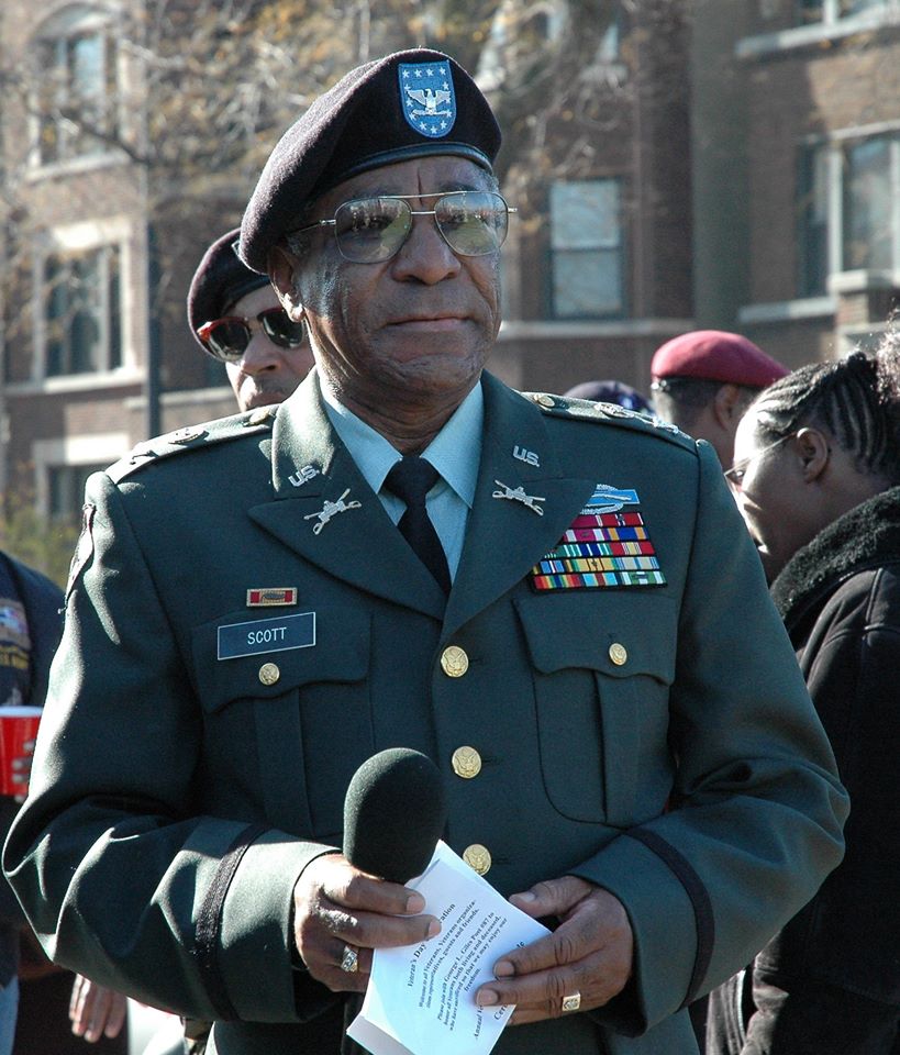 Col. Eugene F. Scott observes operations at the 84th annual Veterans Day Parade.