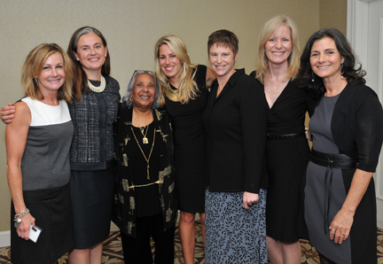 Pictured, from left to right: YWomen Co-Chair Niki Moe Horrell, Kaethe Morris Hoffer, Alice Tregay, Elizabeth Stanton, Amy Skalinder, YWomen Co-Chair Susan Hope Engel, YWCA President/CEO Karen Singer Photo credit: Genie Lemieux, Evanston Photographic Studios