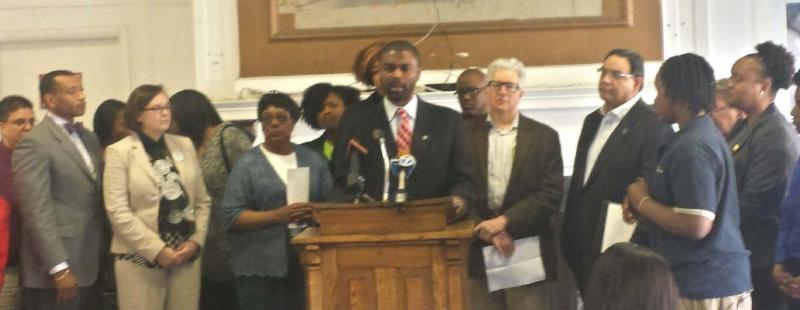 Representative La Shawn K. Ford, D-Chicago flanked by Eric Rubenstein, Executive Director of Single Room Housing Assistance Corporation; Mark Burger, CEDA & Rep. Ford’s Environmental and Energy Adviser; Andrea Durbin, Chief Executive Officer of Illinois Collaboration on Youth; Phillip Jimenez, President and CEO West Cook YMCA; Dashawn Hunt, Teen REACH participant; Wanda Rodriguez, BUILD; Ruth Kimble Childcare Provider & Rep. Ford’s Early Childhood Adviser; Quiwana Bell, Westside Health Authority; Leslie Chestnut; Rev. Dwight Ford; Pastor Robbie Wilkerson; Cynthia Williams.