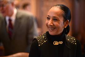 Senator JacquelineCollins gives a victory smile as State Senate passes her bill