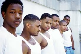 Young Black males lined-up for examination