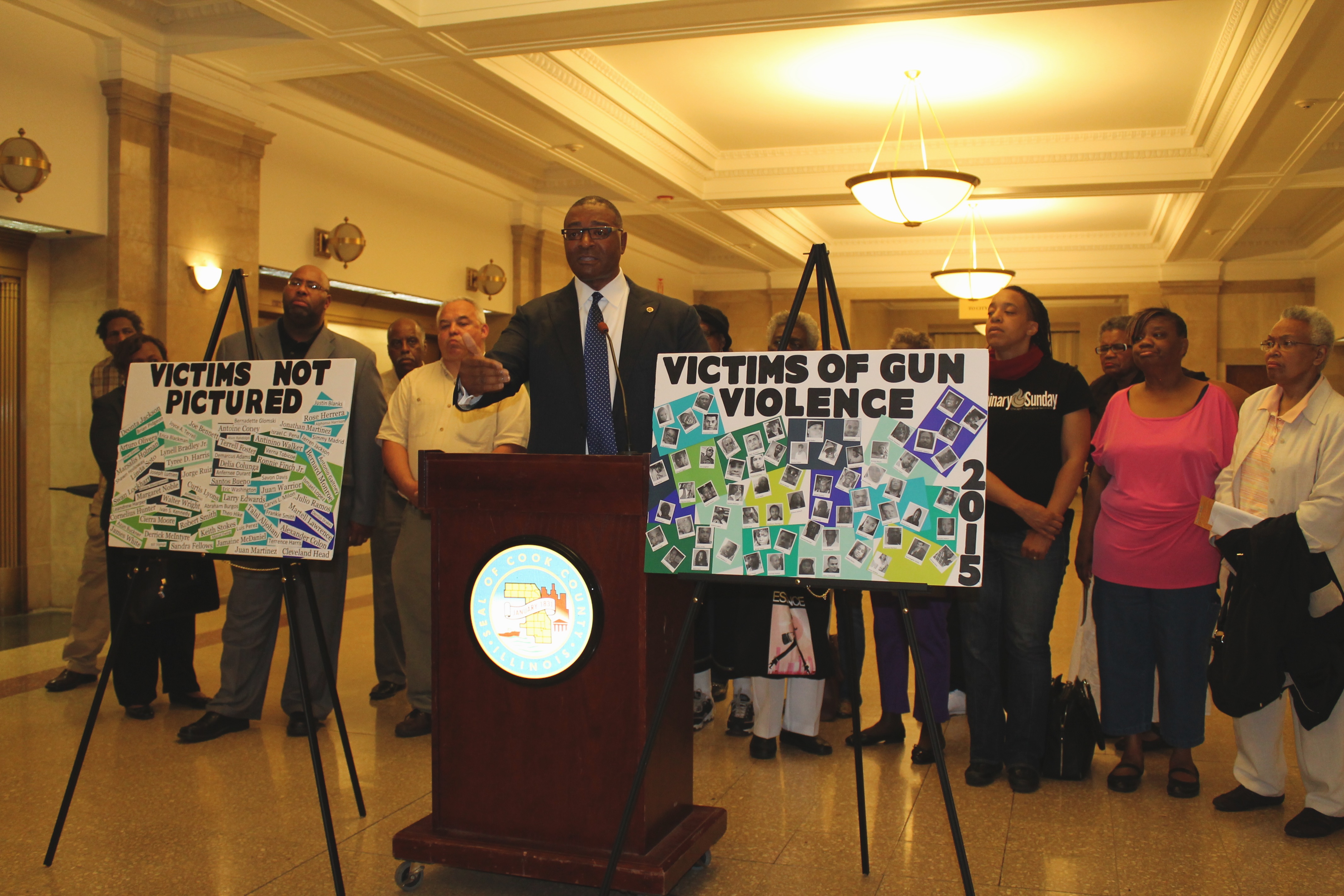 Senator Boykin presents illustrative images that depict the lives lost to violence.