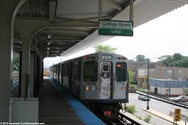 The Green line pulls into the Cottage Grove Station
