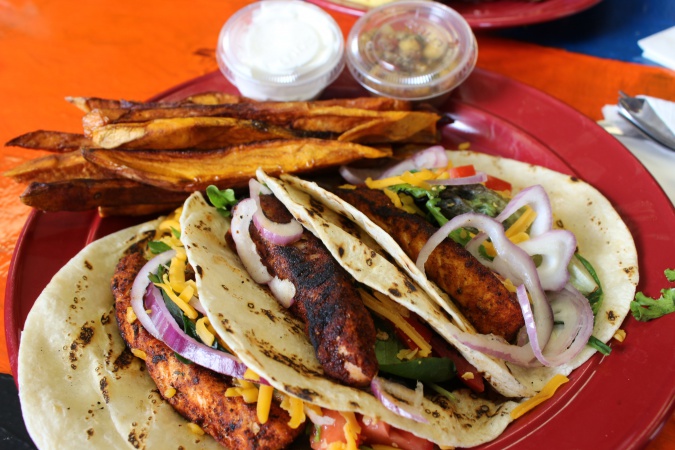 Dream Cafe special Salmon taco entree with sweet potato fries. Prepared by Chef Russell Moore.