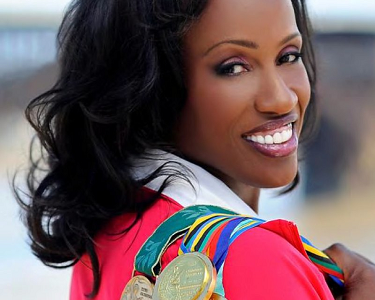 The glamourous  Jackie Joyner-Kerseeoff the track and away from the High bar on the lecture circuit