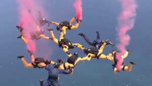 Army navy Parachute team perform fear defying acrobatic jumps in the sky.