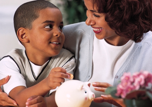 Mother teaching son about money