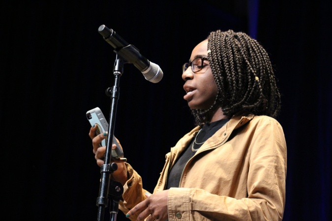 Louder Than A Bomb poet, Chima Ikona recites her poem at Chicago Ideas Week. Photo Credit: Mary L. Datcher