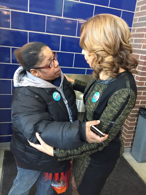 Andrea Zopp talks with a community supporter.