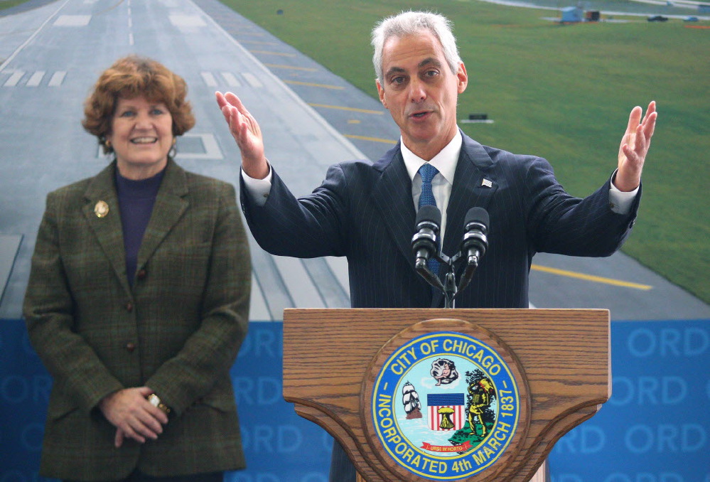 Ginger with Mayor Rahm Emanuel at O'Hara Airport announcing the agreement