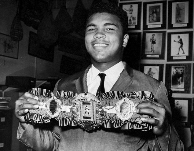 AT 22 years old Muhammed Ali takes the title .