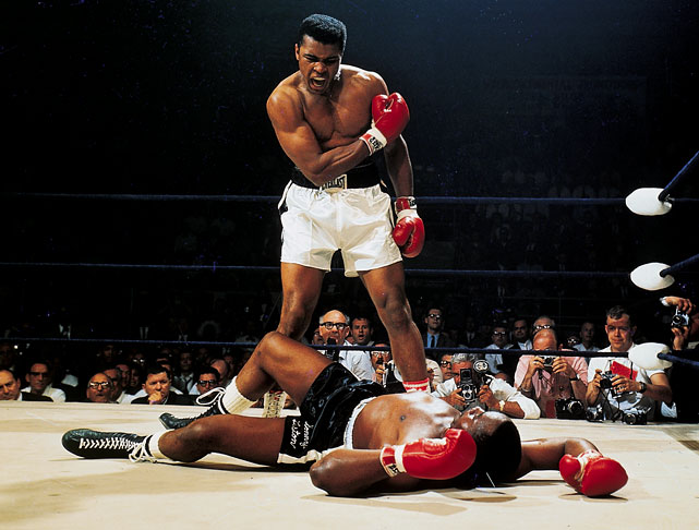 Muhammad Ali defeats Sonny Liston and takes win.