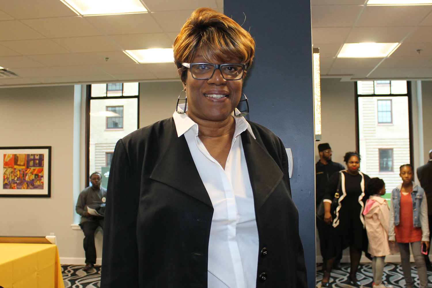 3rd Ward Alderman Pat Dowell inside the Rosenwald's lobby.