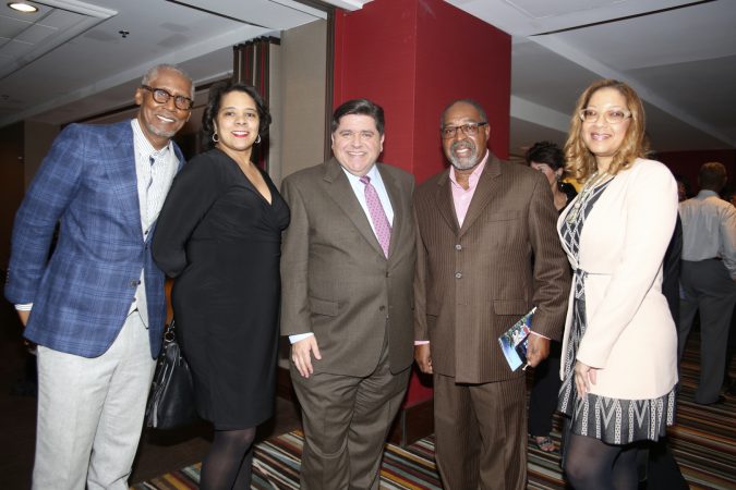 Pictured l-r: Craig Gilmore; Defender Publisher Frances Jackson; J.B. Pritzker, Larry Huggins and friend