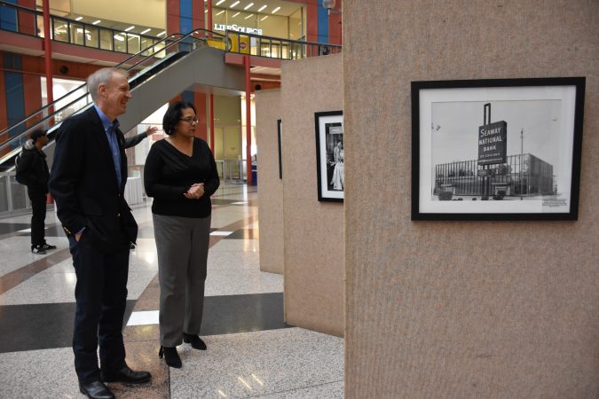 Governor Bruce Rauner and Defender Interim Publisher, Frances Jackson check out the Chicago Defender display at the Illinois State Building.