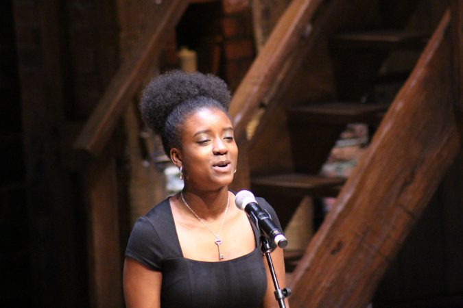 Lindblom Math and Science Academy student, Chloe Johnson performs 'Ode to Phillis Wheatley on the 'Hamilton' stage.