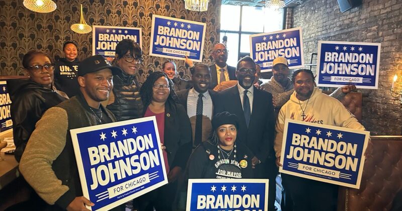 author and team pictured with newly elected mayor brandon johnson