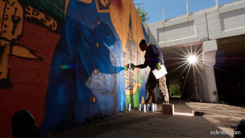 Joe Nelson works on his Pullman Porters Mural