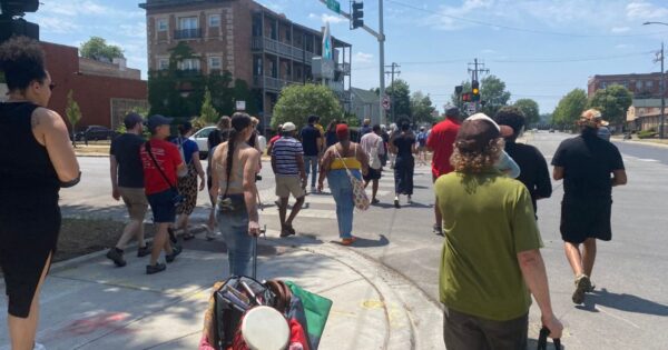 Participants take part in Queer Walking Tour