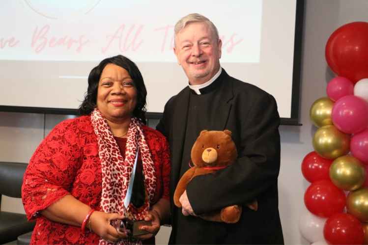 L-R Caregiver award recipients Dr. Rene Allison and Father Larry Dowling, pastor, St. Agatha Church. 