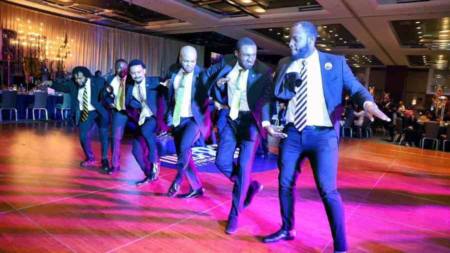 Men of Alpha Phi Alpha participating in the Greek stroll at the UNCF “A Mind Is…” Gala 