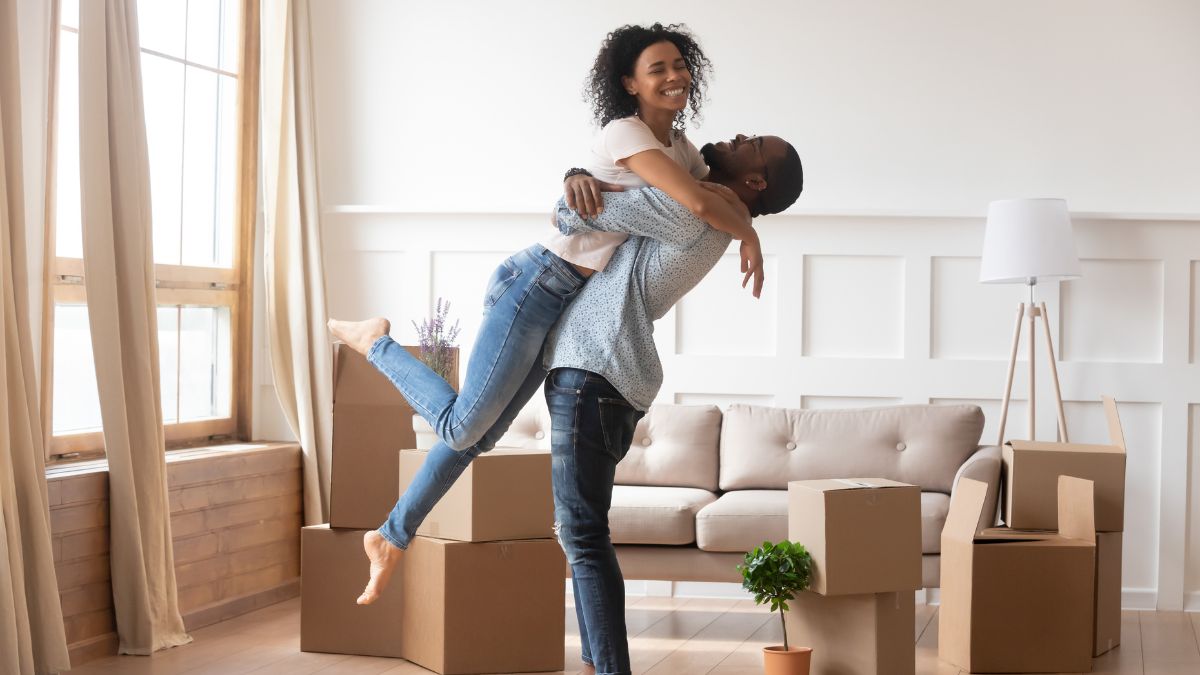 Couple celebrates buying first home