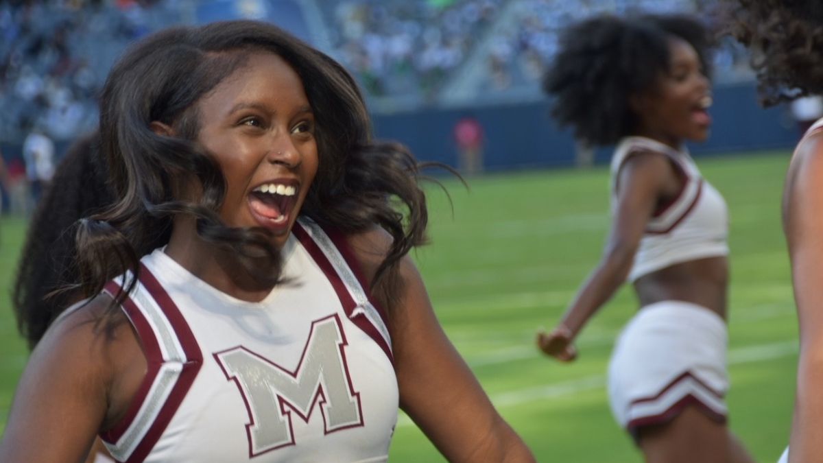 A Morehouse cheerleader and her squad put on an exuberant display during the CFC.