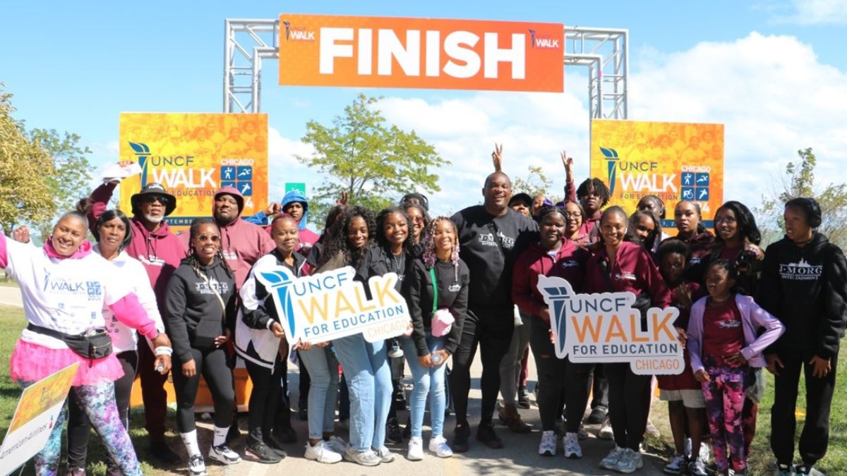 UNCF Walk for Education teams celebrate at the finish line.