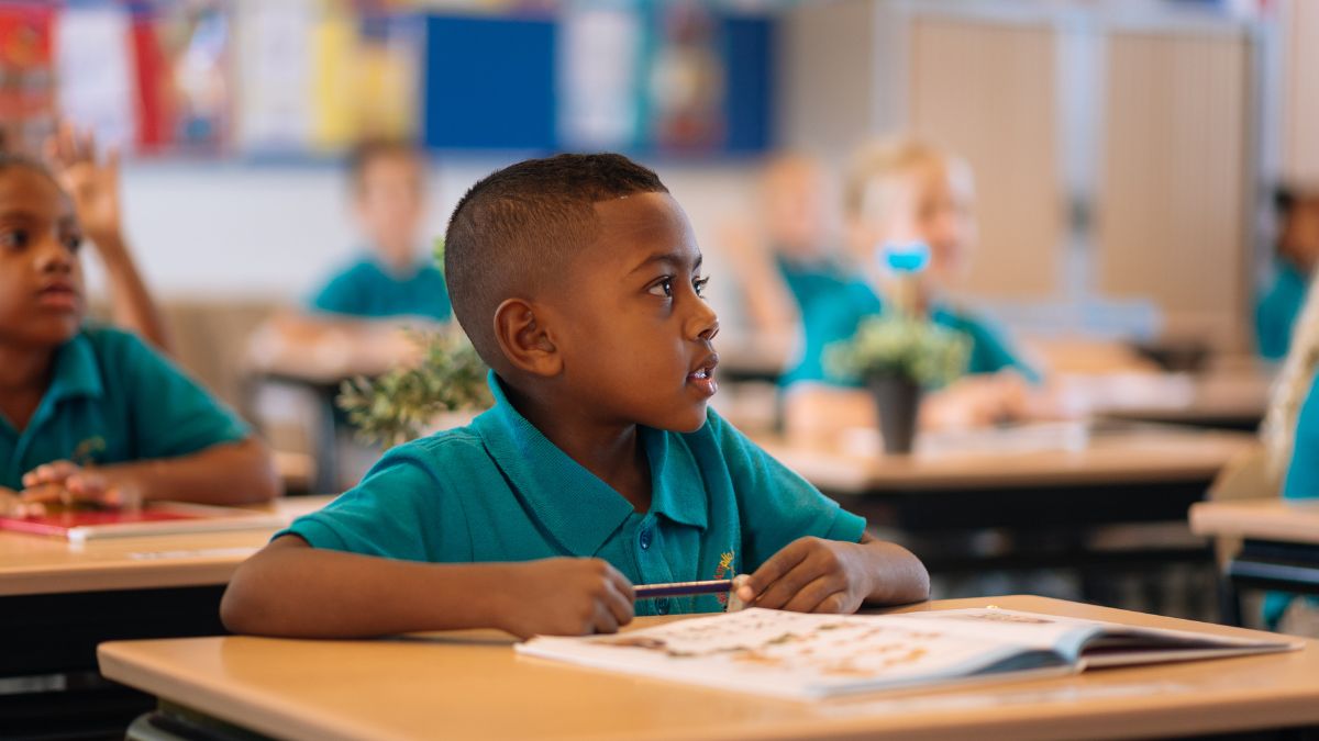 Grade school kids in a classroom. Splento Images.