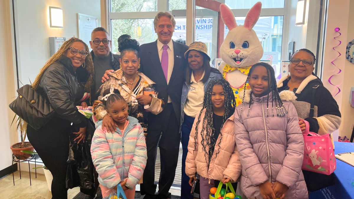 Local Family with Supervisor Calvin Jordan, Trustee Small, and Easter Bunny