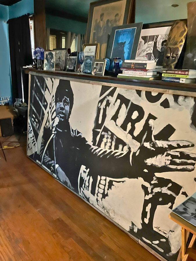 Mural style art of Fred Hampton Sr. at The Hampton House. 