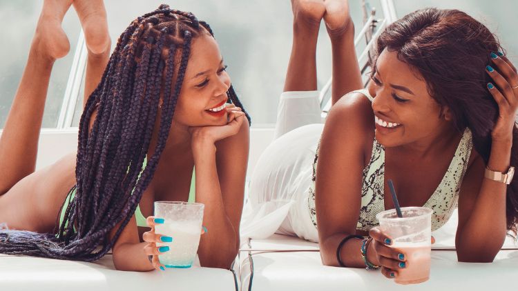 Black women on a yacht, _tre's visualz , Pexels